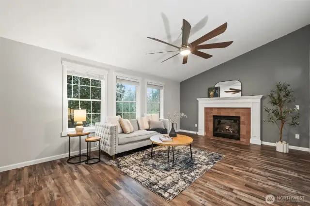 This room features vaulted ceilings and a propane fireplace.