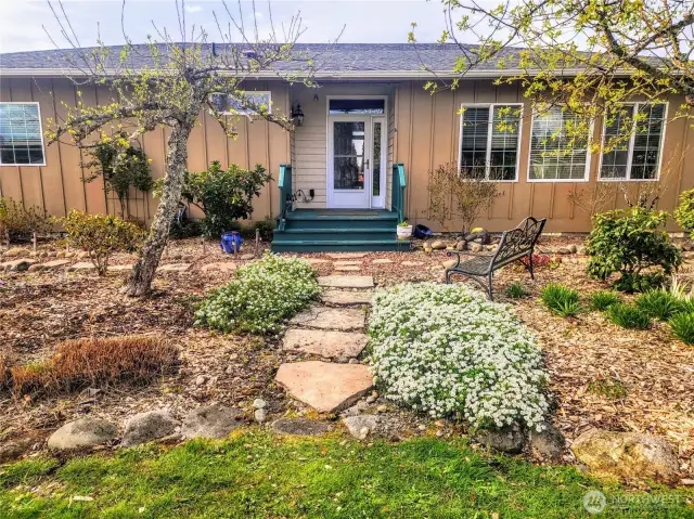 Close up of the exquisite landscaping surrounding the rear home.