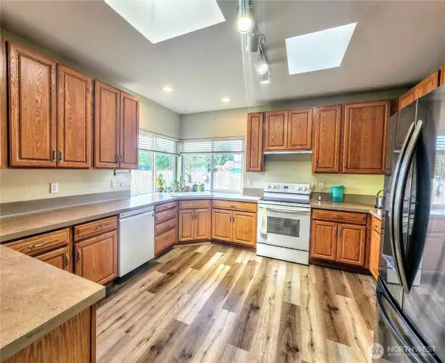 Awesome kitchen in the 2nd home.  So many cabinets and excellent counter space.