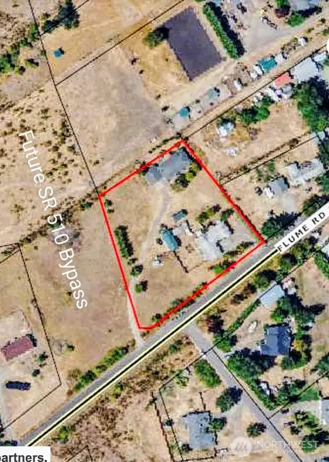 Aerial of the property and surrounding area.