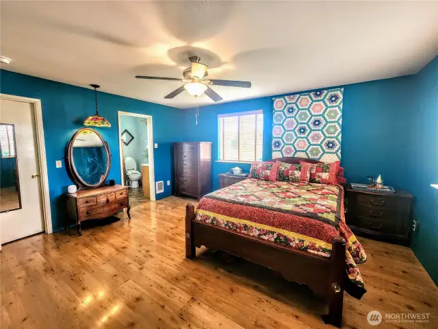 Large primary suite with walk-in closet and bath.