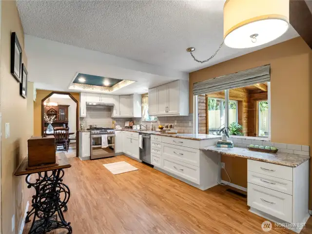 Room for it all: home office, kitchen table, or add a kitchen island for additional workspace.