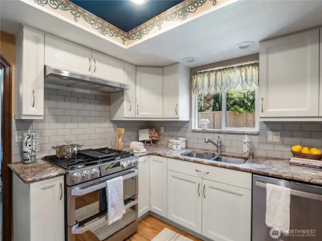 The high end gas stove is a chefs delight and the granite counter tops are beautiful and easy to clean.