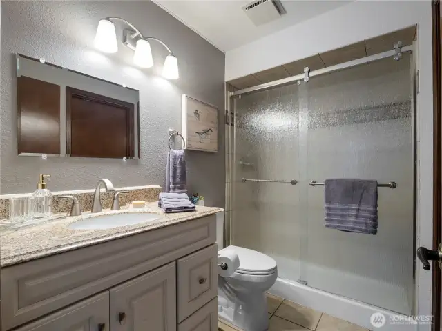The 3/4 bath has a large walk in shower.