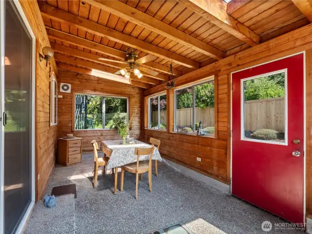 This great sunroom is wired for a hot tub and is wonderful to use to extend the summers in the north west.