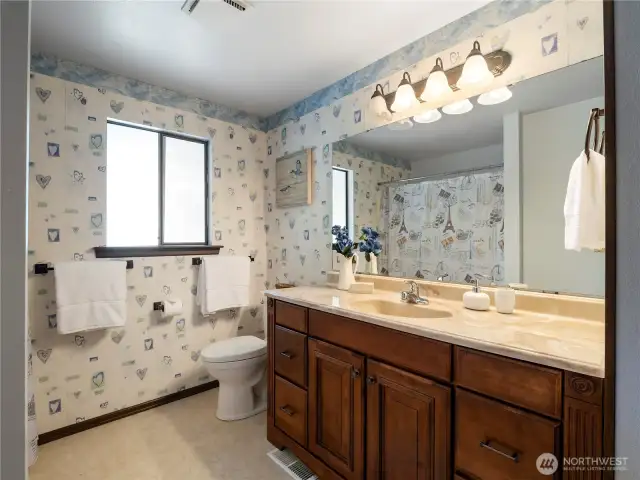 The full bath on off the smallest bedroom on the top floor.