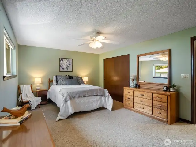 The spacious primary bedroom.