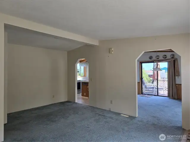 Living room with alcove that flows into dining & Kitchen