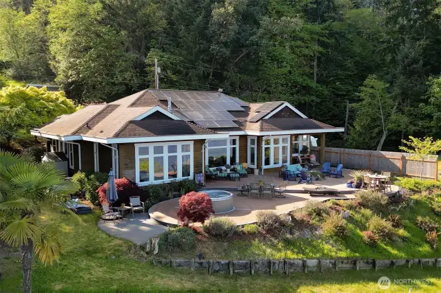This extraordinary 4-acre property offers unparalleled privacy, a private-access beach, boat mooring, a versatile ADU.