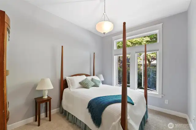 Airy bedroom with lots of space.
