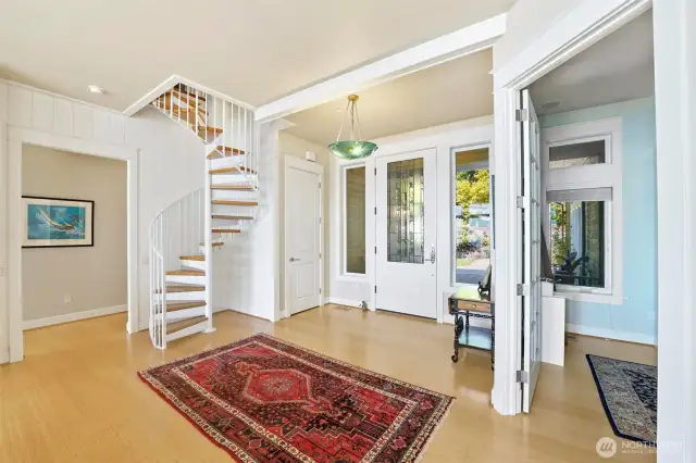 Spiral staircase to loft adds more space to an this expansive home.