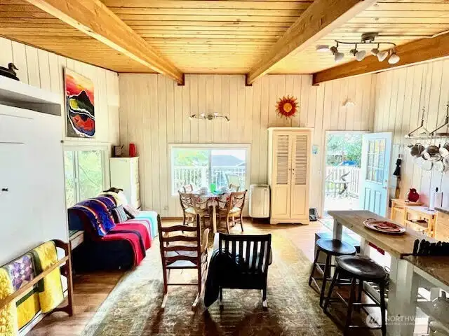 466 sqft Guest House with a Murphy Bed, wood burning fireplace and a deck.