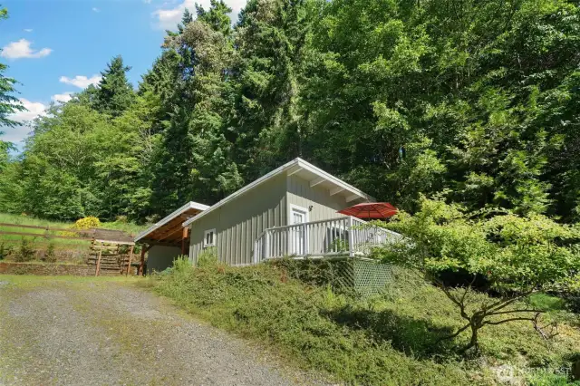 *Guest house is perfect artist's studio, or rental income, the 466 sqft cottage features a full deck with water views.