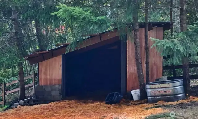 Built in 2021, the horse barn accommodates two horses year round.