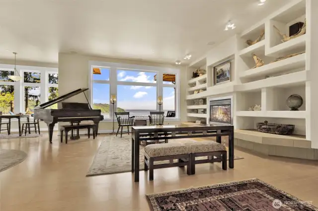 Expansive windows for sweeping view of Puget Sound, Mount Rainier and Cascade mountain range with sunrise view