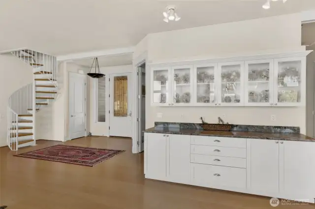 Open layout living and dining area with lots of storage.