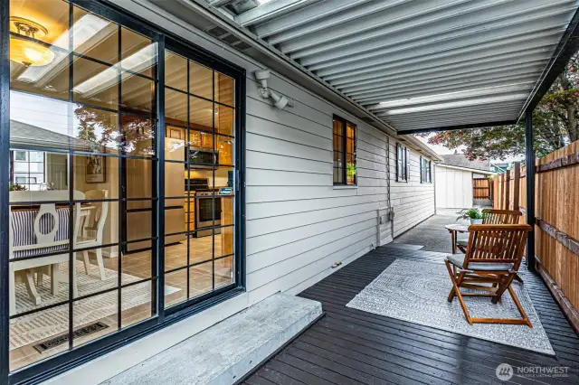 Rear covered deck for four season living & grilling.