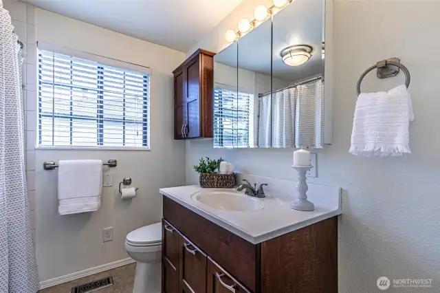 Main hall bathroom is a full bath with tub/shower.