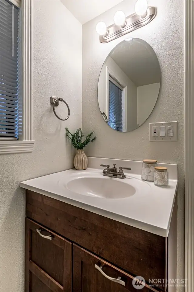 Vanity in 3/4 bathroom.