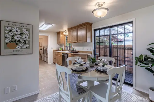 Kitchen & dining area with ceramic tile flooring.