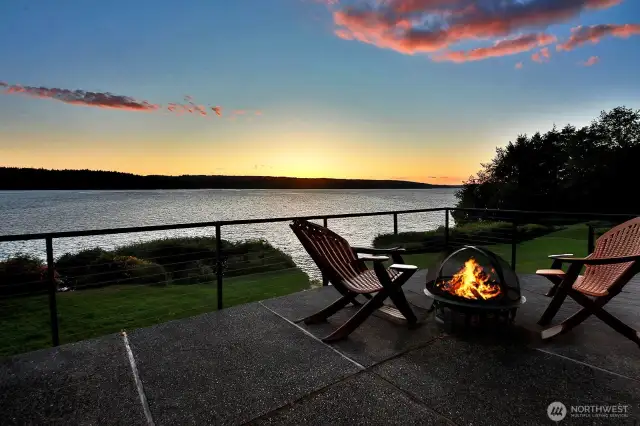 Exceptional waterfront living on 7+ acres with 254' of shoreline, a protected cove for mooring, and unforgettable sunset views. Sweeping vistas of the Sound and Olympic Mountains create a rare blend of natural beauty, luxury, and lifestyle.