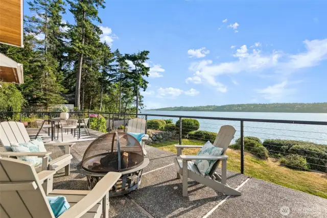 Perfect for al fresco dining or sunset watching, this outdoor space invites you to unwind and savor the beauty of the natural surroundings.