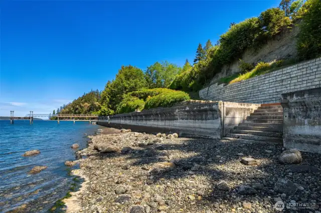 Sweeping low-tide shoreline reveals the natural beauty of your private beachfront—perfect for beachcombing, kayaking, and enjoying ever-changing coastal scenery just steps from your door.