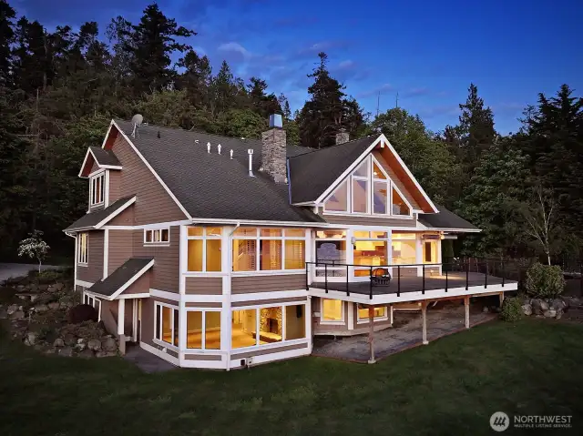Designed to maximize its stunning setting, this home was built with views from nearly every room. Expansive windows draw the eye outward, filling the interiors with light and showcasing the natural beauty beyond.