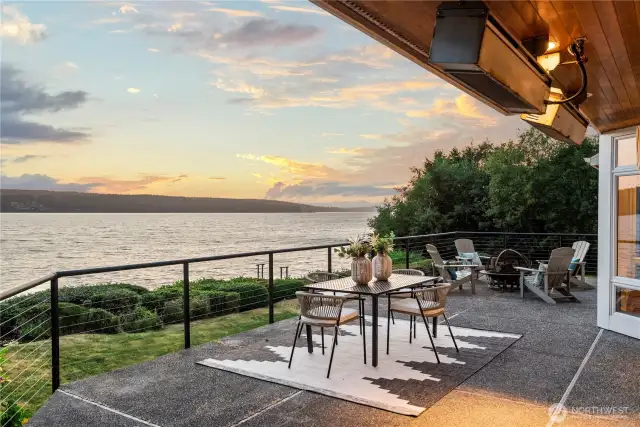 The deck’s thoughtful design enhances the flow between indoor and outdoor living, creating a peaceful retreat with unobstructed, private views of the water.