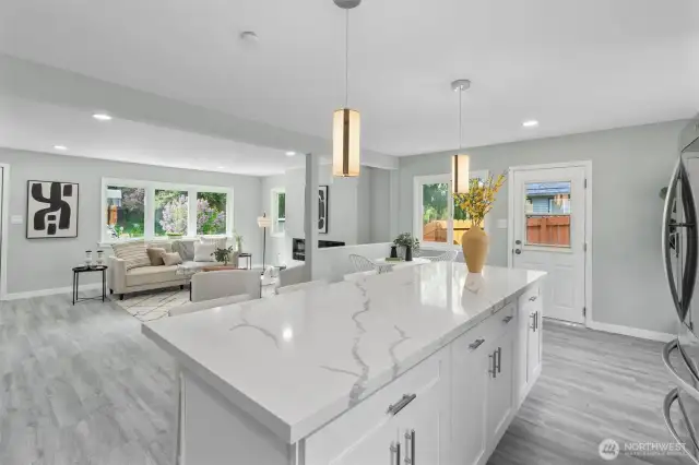 New stainless steel appliances, quartz countertops, huge island. Breakfast nook.