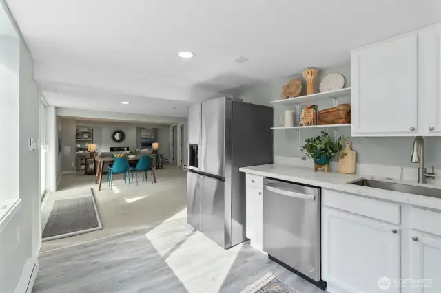 ADU Kitchen has new stainless steel appliances, new cabinets, quartz countertops.