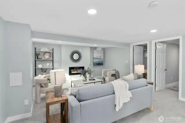 Second living room in ADU or MIL unit. Spacious with new carpeting, new fireplace, new millwork and new paint.