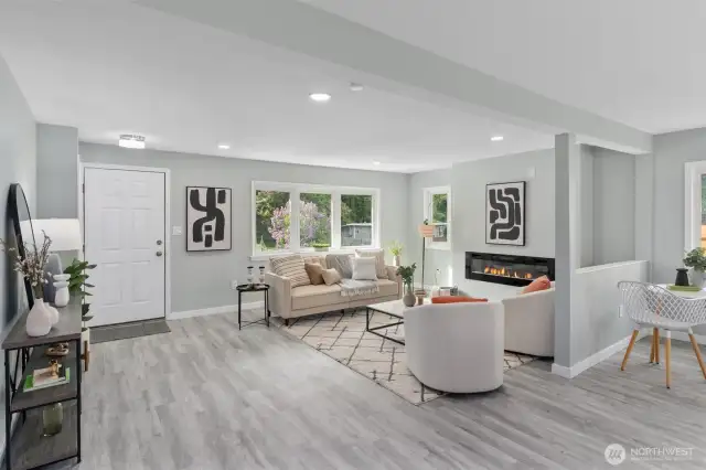 Everything new inside with new engineered hardwood floors. Electric fireplace. Beautiful vinyl windows.