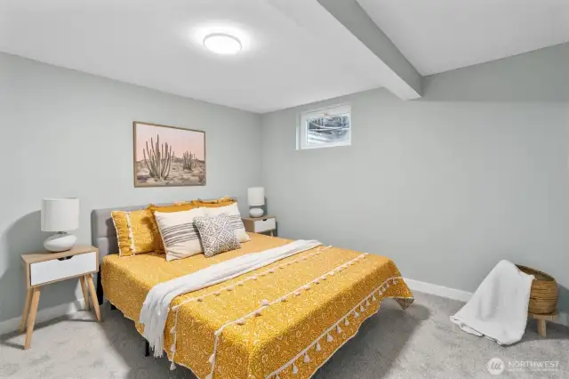 Nicely refreshed bedroom with new carpeting, millwork and paint.