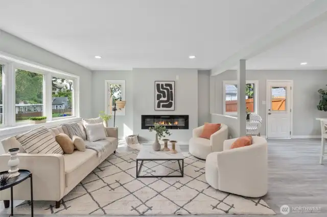 Everything new inside with new engineered hardwood floors. Electric fireplace. Beautiful vinyl windows.