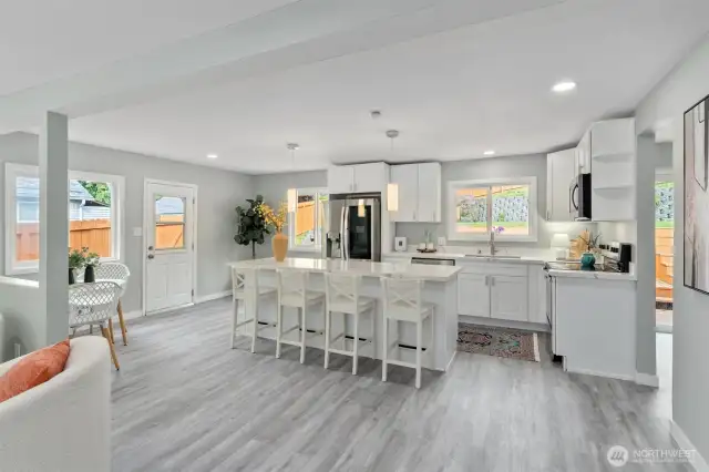 New stainless steel appliances, quartz countertops, huge island. Breakfast nook.
