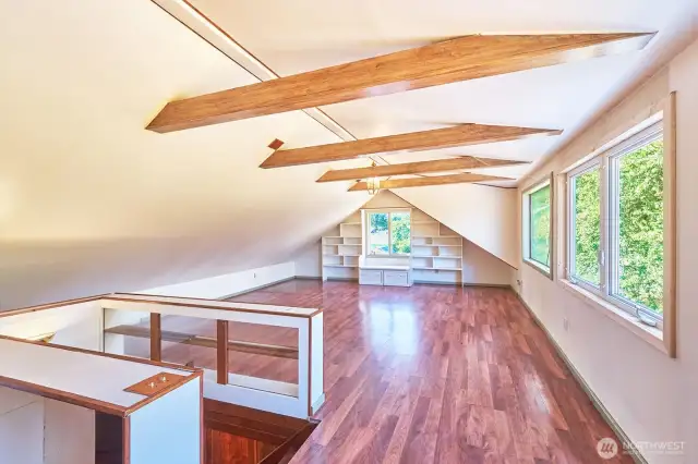 Expansive full floor light filled primary bedroom or studio, looking south.