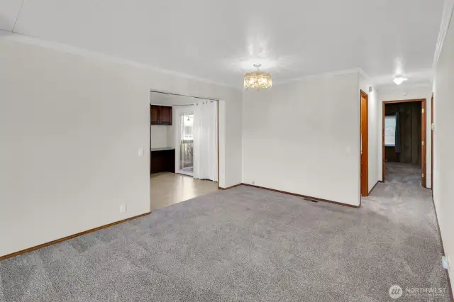 Formal dining area opens to living room to have your dining table open with all the leaves at holidays!