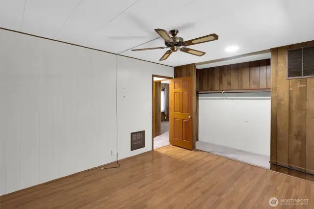 Guest bedroom closet doors were removed by prior  owner who used it as an office.