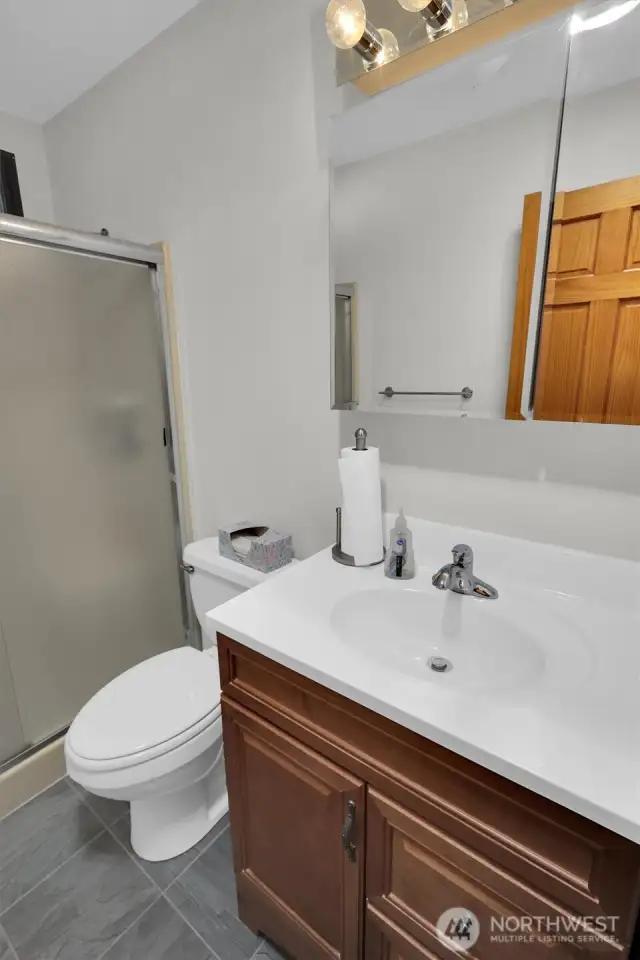 Primary bedroom suite with walk in closet.