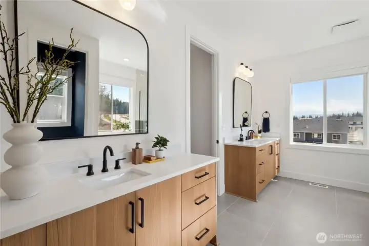 Primary bathroom is spacious and functional!