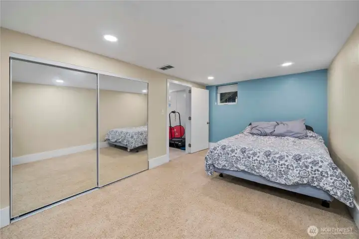 One of the downstairs bedrooms, with a large closet.