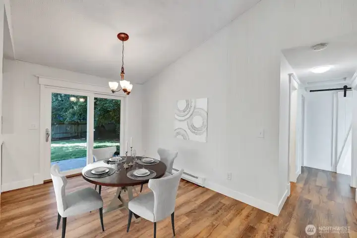 Dining room with sliding glass door to rear patio.