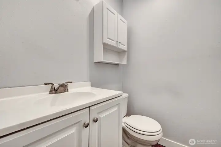 Half bath off primary bedroom.