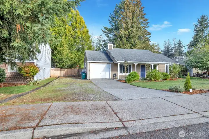 Extra parking next to garage has space for a boat or RV.