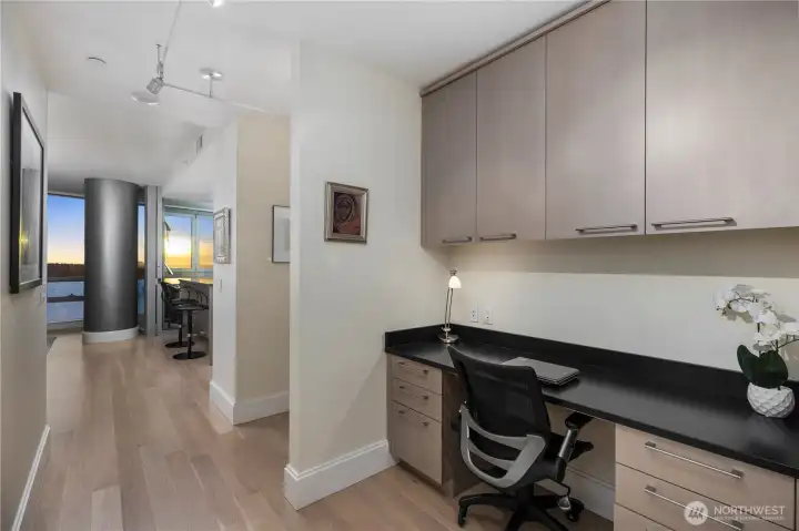 Hallway has a good size home office with plenty of storage space