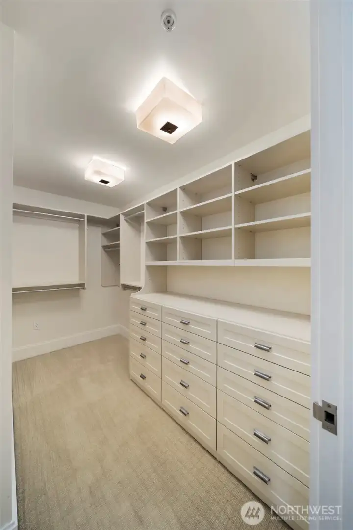 Primary closet allows you to fully organize your full wardrobe