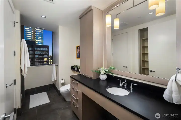 Second ¾ bath with ultra quiet Meile Washer/Dryer tucked away behind a solid door