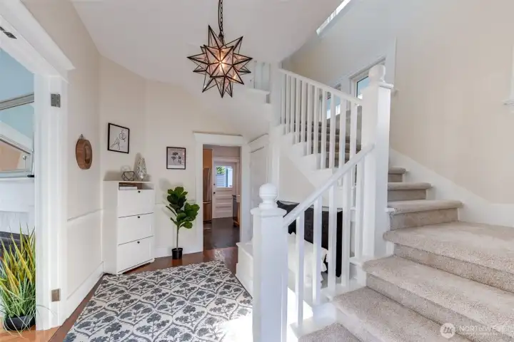 Foyer complete with built in bench. Door straight ahead leads to the kitchen, door to the left leads to the living room.