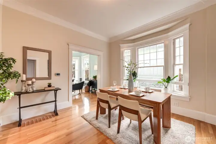 Generous sized dining room has plenty of room for guests.